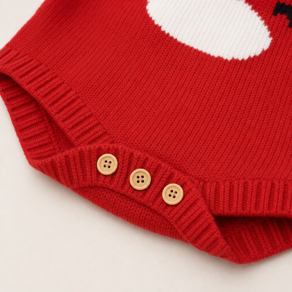 Stickad babybody med julmotiv